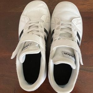 White leather Adidas.